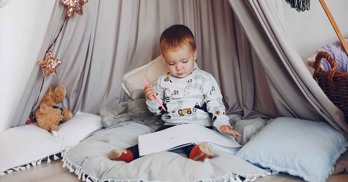 Baby reading a book