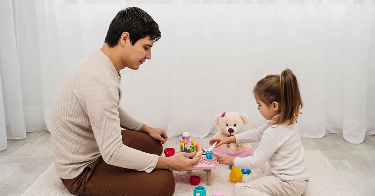 Father and daughter playing