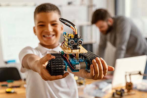 Father and son making robot
