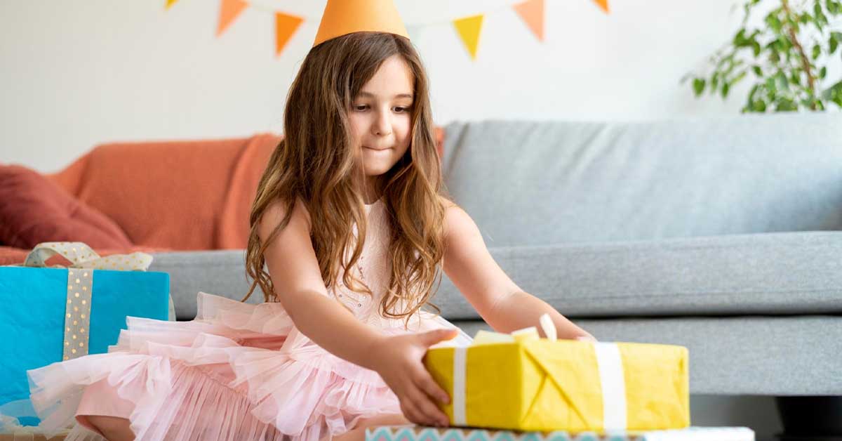 girl taking gift