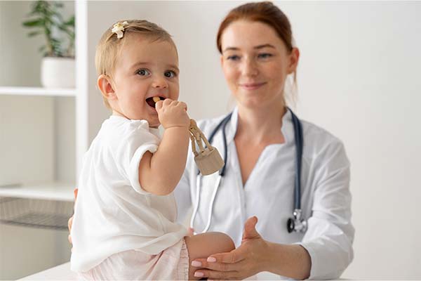 doctor holding baby