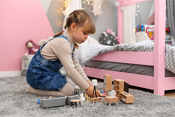 child playing in her room