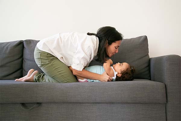 Mother playing with child