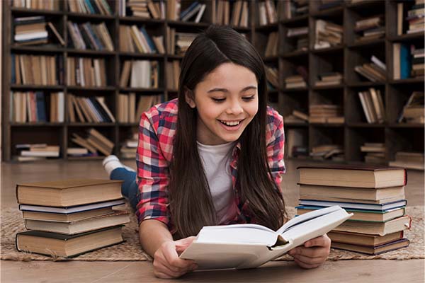 girl studying at the library