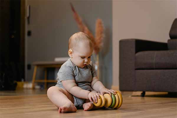 Baby playing with newborn toys 
