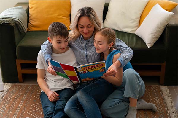 woman and kids reading comics 