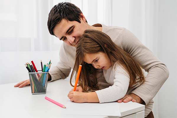 father improving his child handwriting 