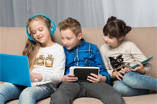 Technology concept with young kids