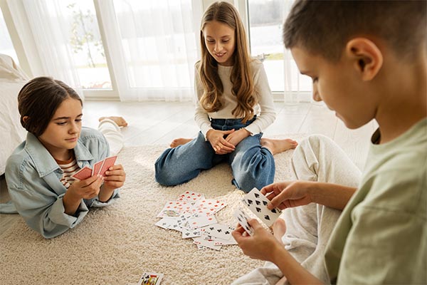 Kids playing with cards