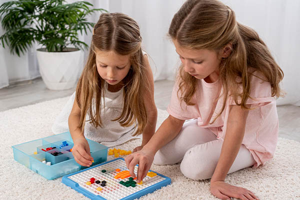 Girls playing a classic board game